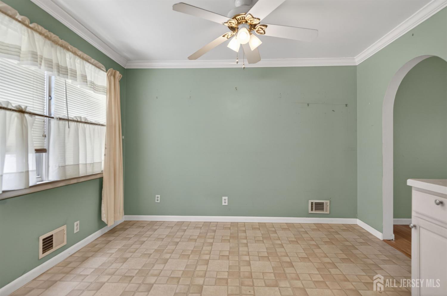 24 Moryan Road Edison, NJ 08817 - Photo 8 of 33 a view of an empty room with a window