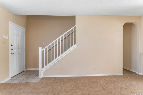 a view of an entryway with staircase