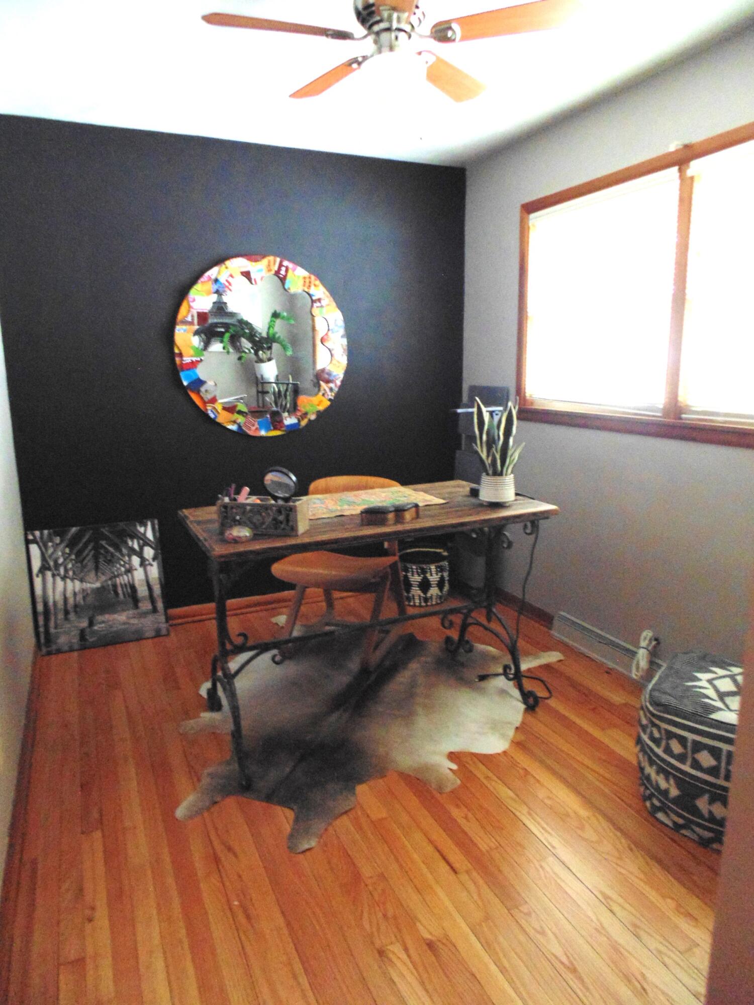 6801 Forest Avenue Gary, IN 46403 - Photo 14 of 23 a workspace with furniture window and wooden floor
