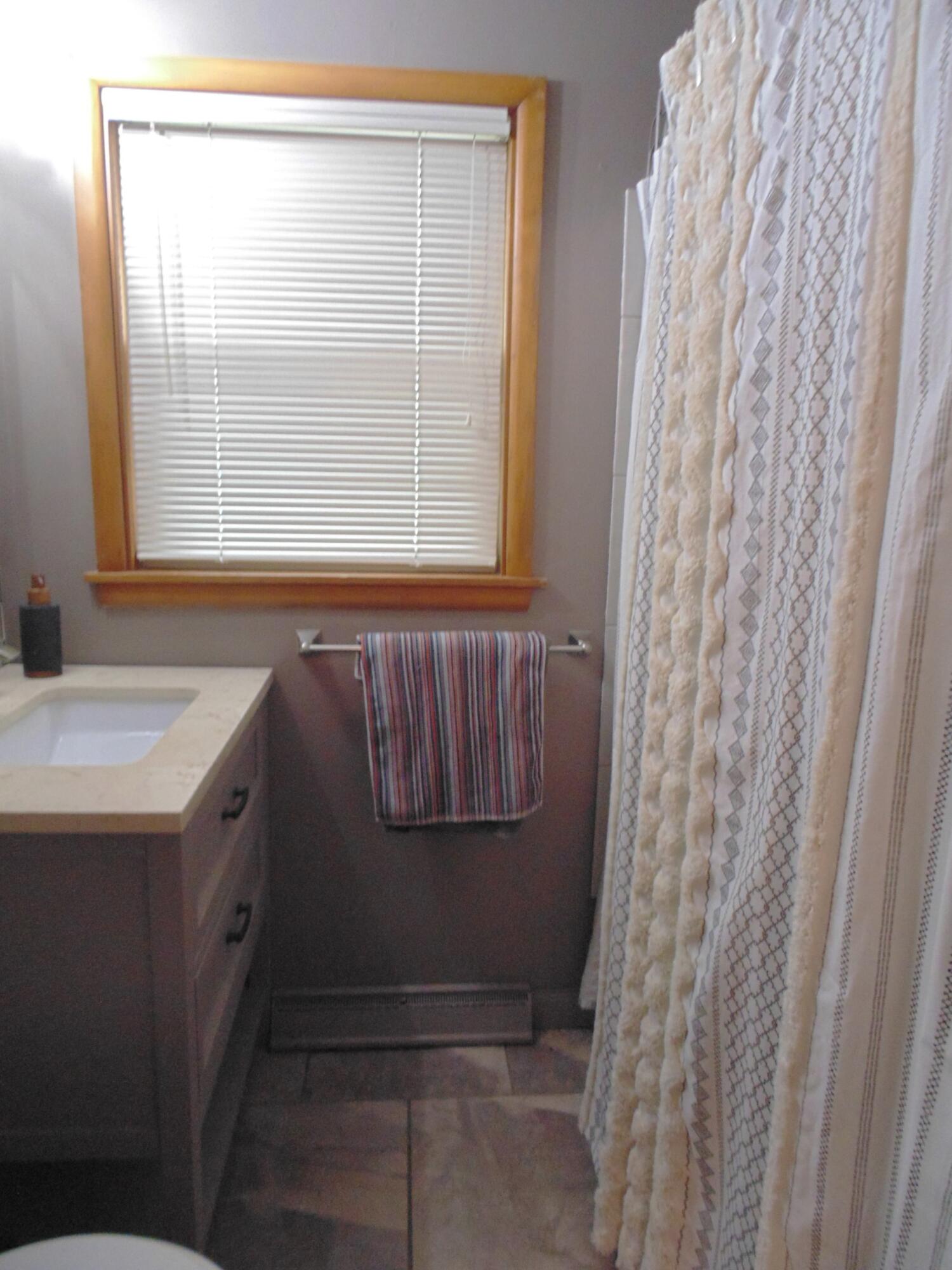6801 Forest Avenue Gary, IN 46403 - Photo 15 of 23 a bathroom with a sink and a tub