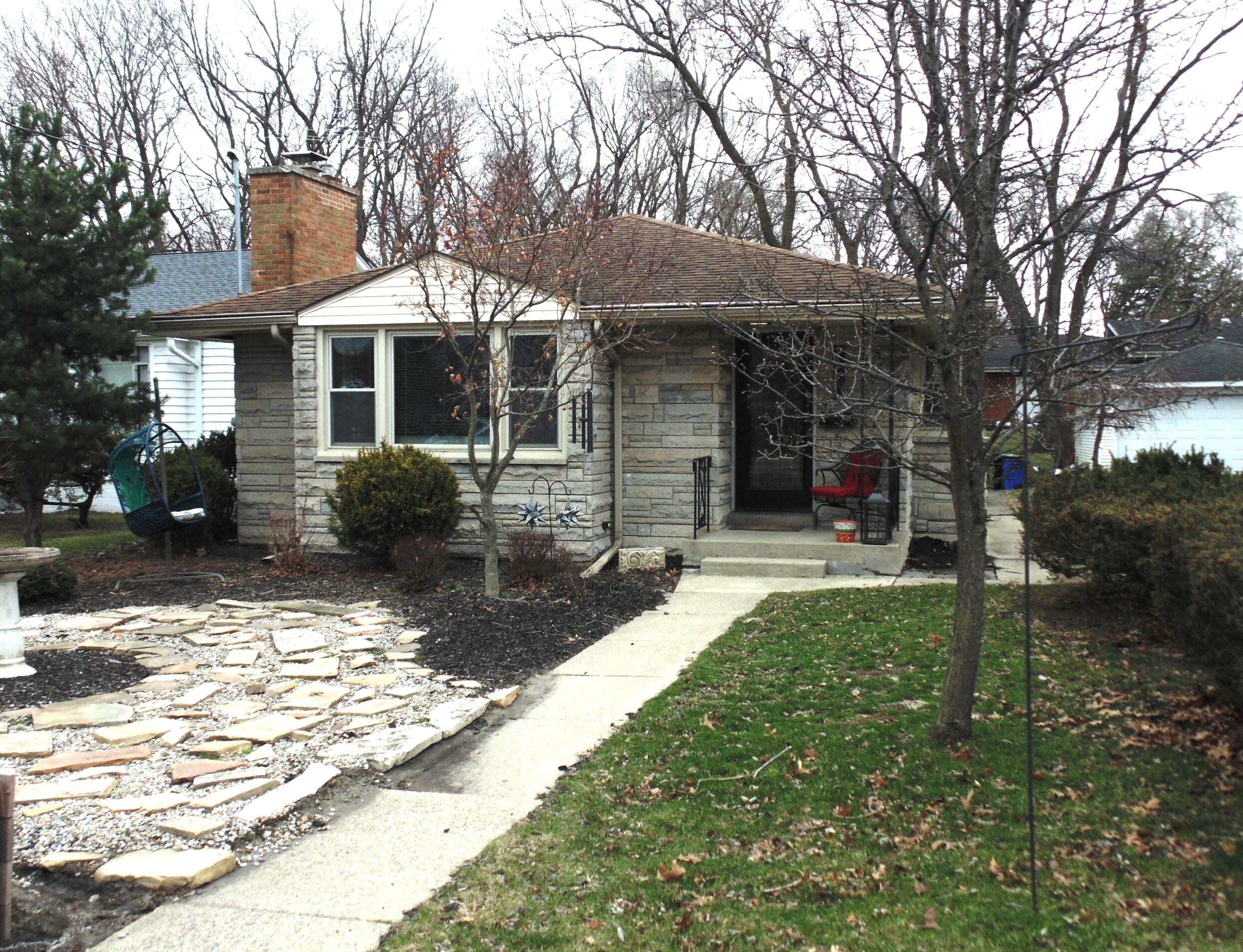 6801 Forest Avenue Gary, IN 46403 - Photo 2 of 23 a front view of a house with a yard