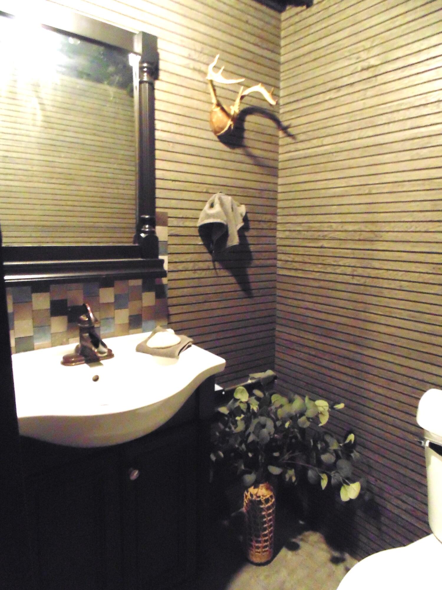 6801 Forest Avenue Gary, IN 46403 - Photo 21 of 23 a bathroom with a sink toilet and vanity