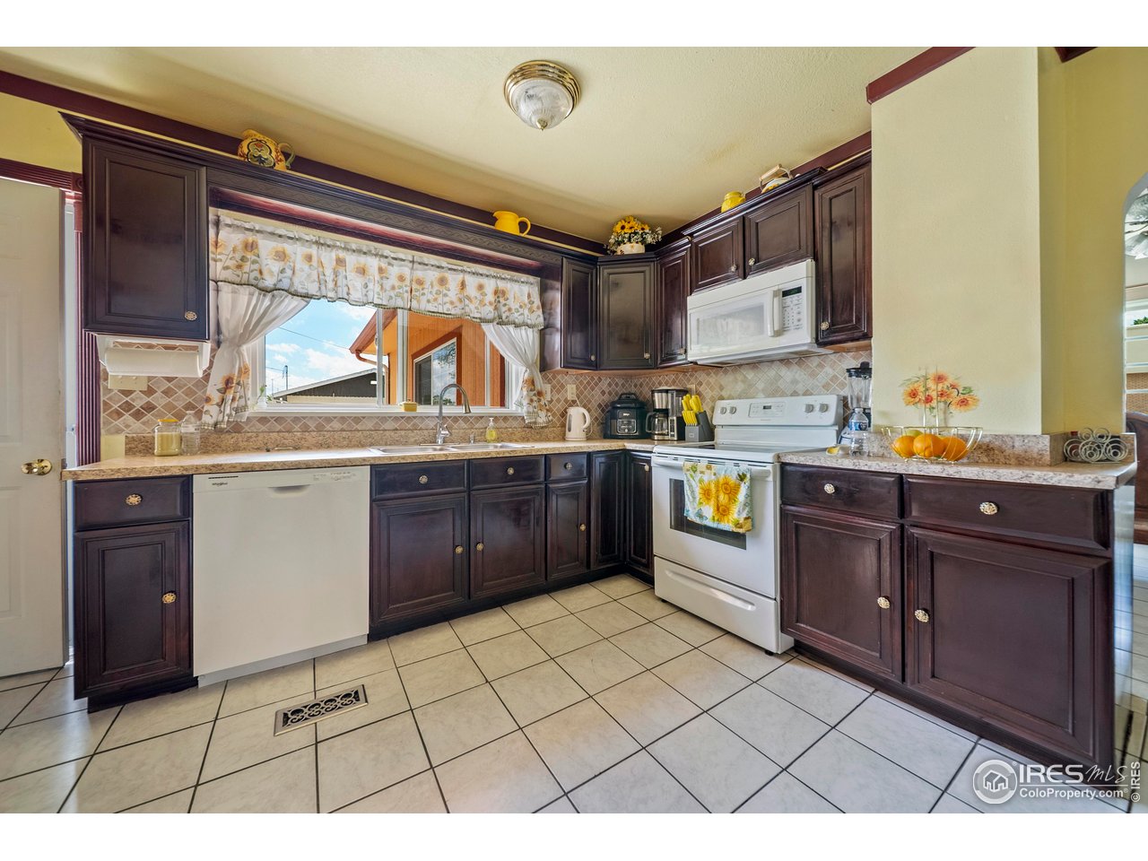 616 West Street Fort Morgan, CO 80701 - Photo 11 of 21 a kitchen with a cabinets and counter space
