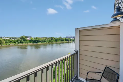 a view of a lake from a balcony