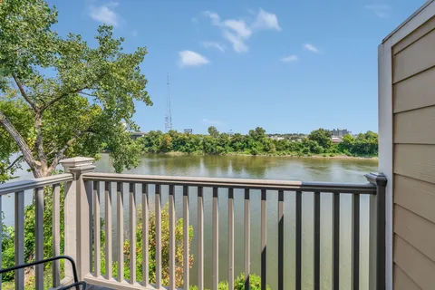 a city view from a lake from a balcony