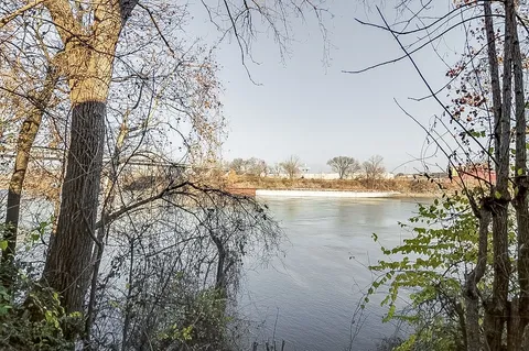 a view of a lake with a city