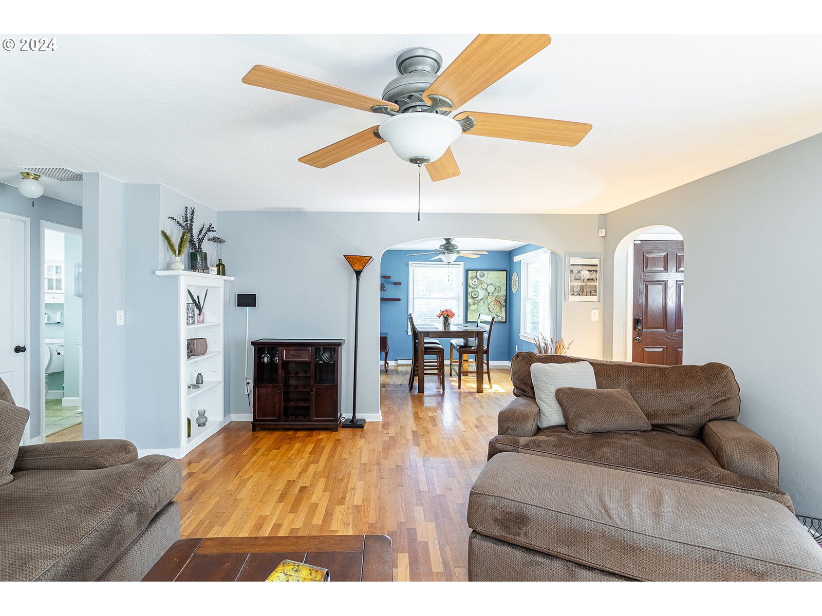 2275 Cal Young Road Eugene, OR 97401 - Photo 11 of 36 a living room with furniture and a fireplace