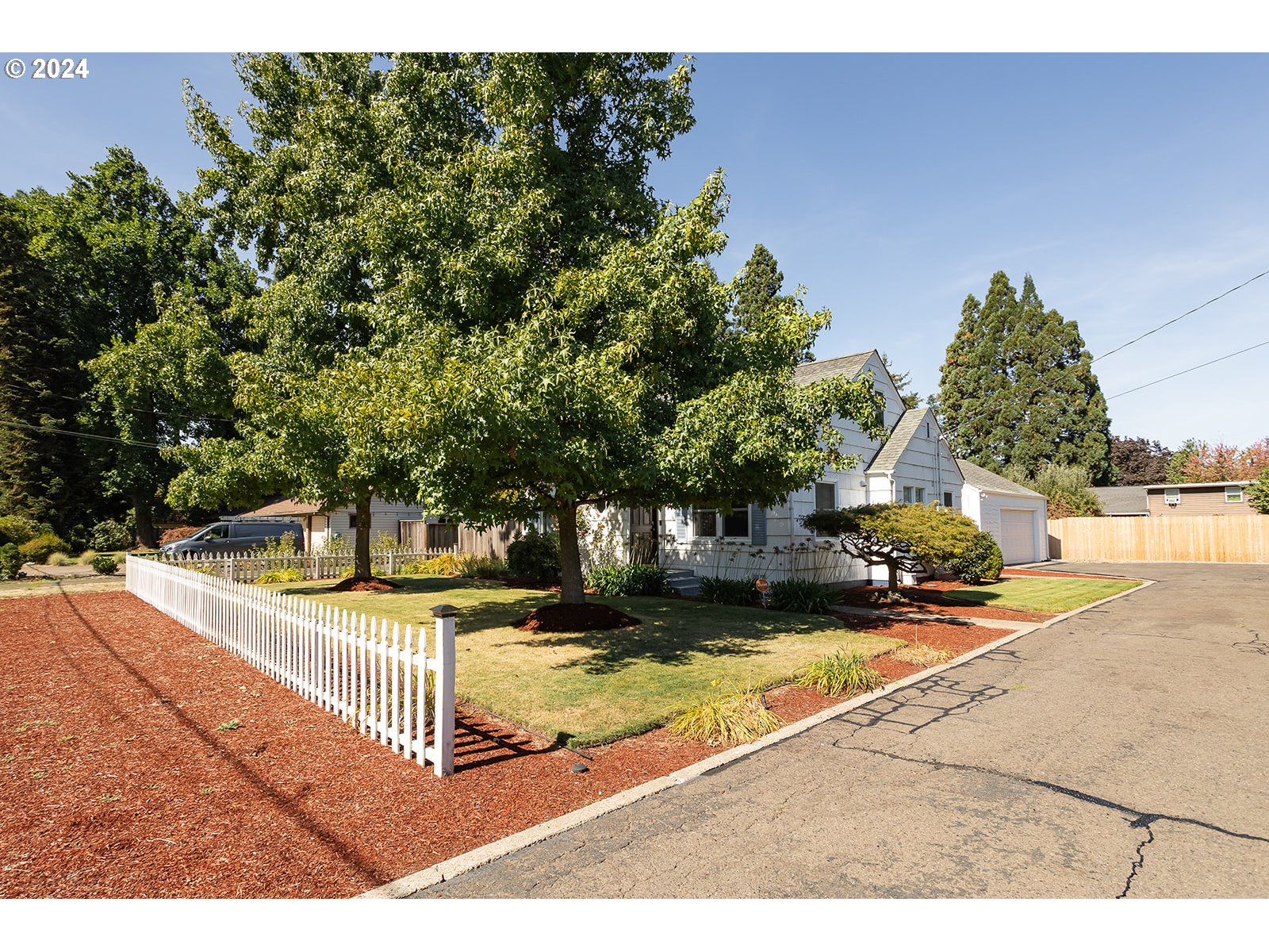 2275 Cal Young Road Eugene, OR 97401 - Photo 2 of 36 a view of a swimming pool with an outdoor space and seating area