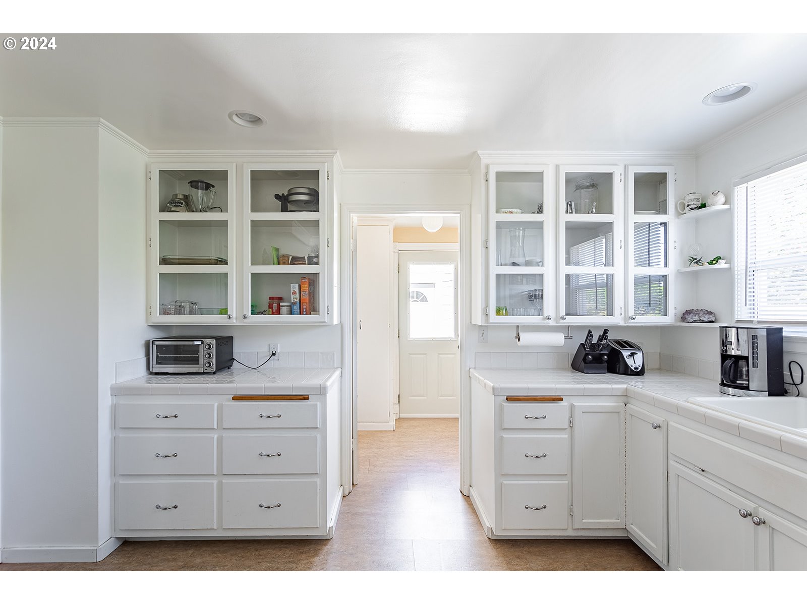 2275 Cal Young Road Eugene, OR 97401 - Photo 21 of 36 a kitchen with a refrigerator and cabinets
