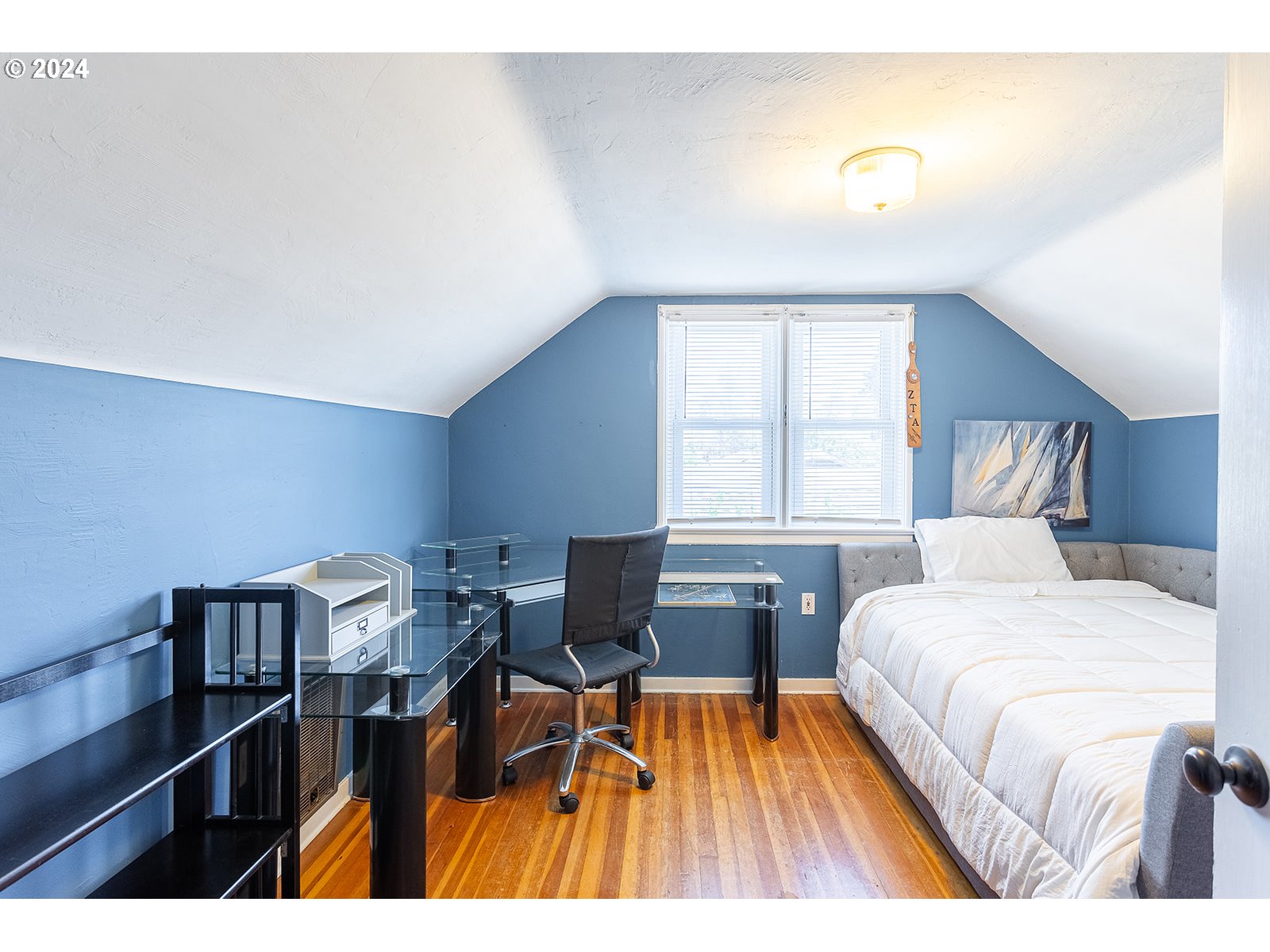 2275 Cal Young Road Eugene, OR 97401 - Photo 27 of 36 a bedroom with a bed and a window