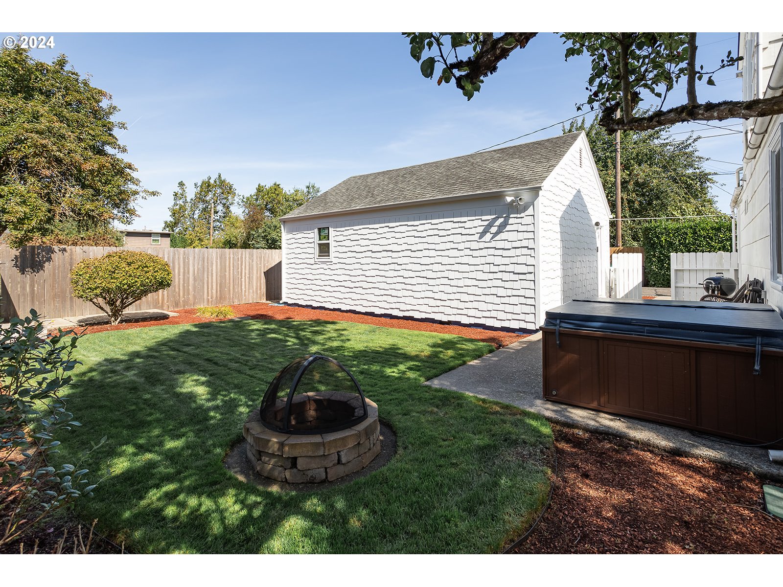 2275 Cal Young Road Eugene, OR 97401 - Photo 36 of 36 a backyard of a house with table and chairs