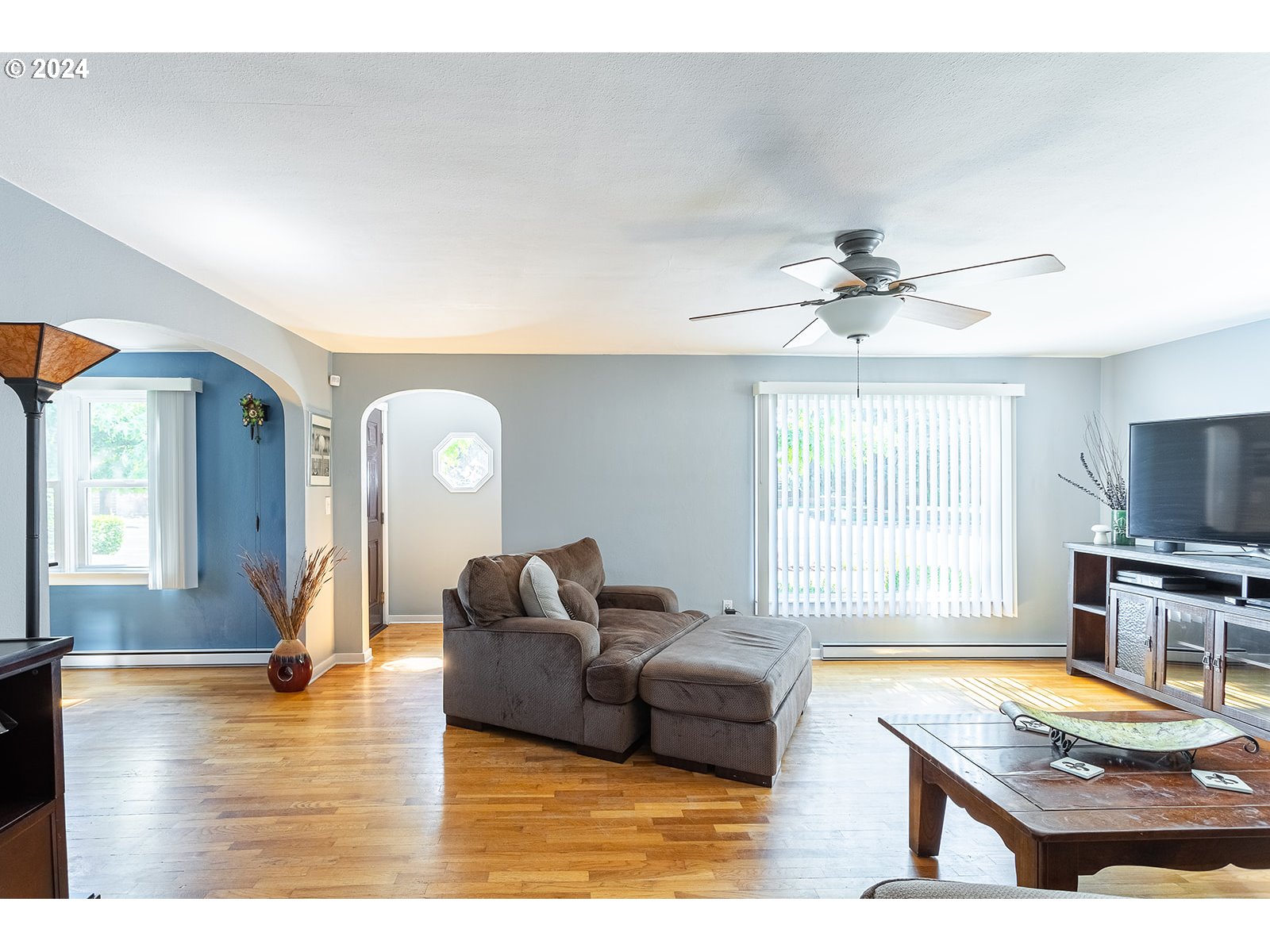 2275 Cal Young Road Eugene, OR 97401 - Photo 8 of 36 a living room with furniture and a wooden floor