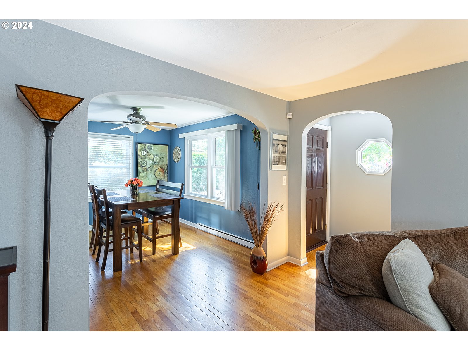 2275 Cal Young Road Eugene, OR 97401 - Photo 10 of 36 a living room with furniture and a wooden floor