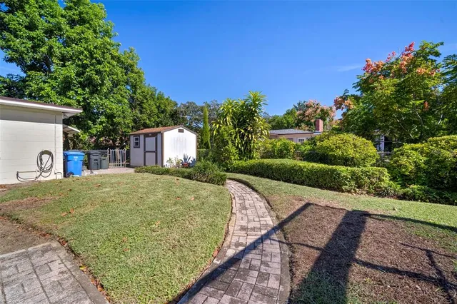 a view of backyard with outdoor space