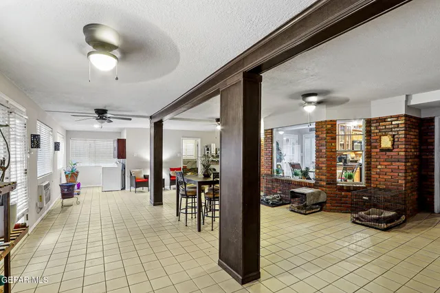 a lobby with furniture and a large window