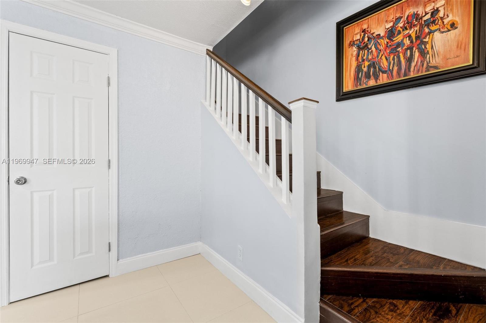 3370 Beau Rivage Drive, Unit B8 Pompano Beach, FL 33064 - Photo 29 of 33 a view of entryway and hall with wooden floor