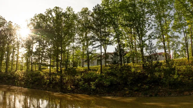 a kitchen with a sink stove and refrigerator