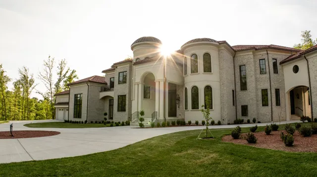 a kitchen with stainless steel appliances a stove sink and refrigerator
