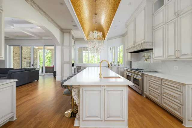 a bathroom with bathtub and windows