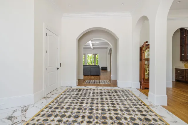 a living room with furniture flat screen tv and fireplace