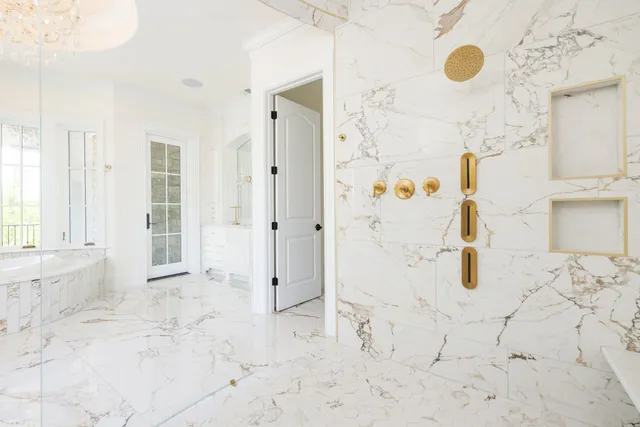 a view of an empty room with a fireplace