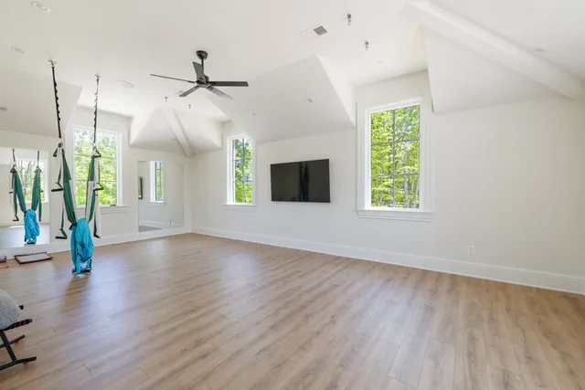 a view of a kitchen with a sink and a window