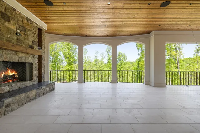 a kitchen with stainless steel appliances a stove and a microwave