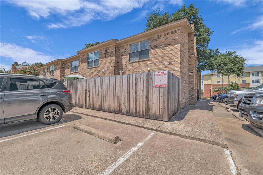 1349 South 11th Street Waco, TX 76706 - Photo 16 of 17 a front view of a house with parking space
