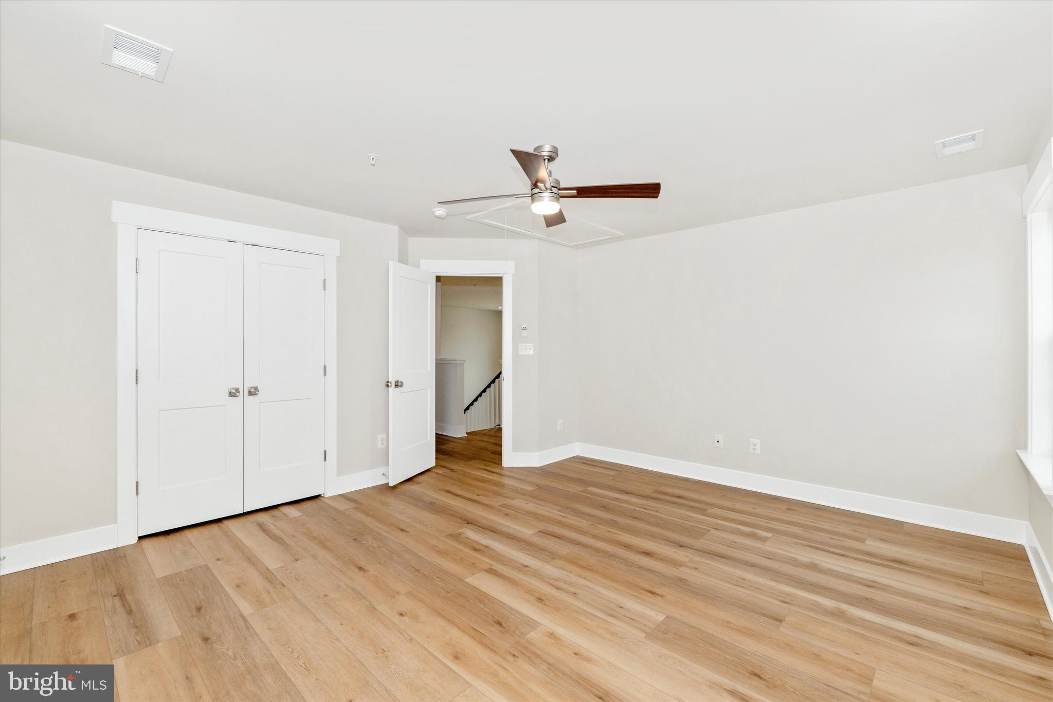 10230 Daysville Road Walkersville, MD 21793 - Photo 32 of 43 a view of empty room with wooden floor
