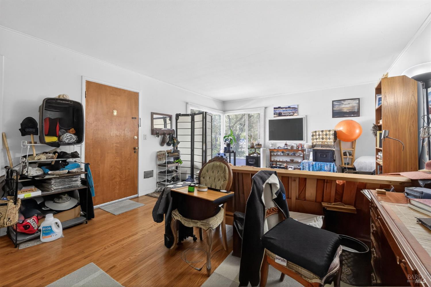 1204 14th Street Santa Rosa, CA 95404 - Photo 18 of 26 1202 14Th Street, Spacious living room with hardwood flooring and corner windows