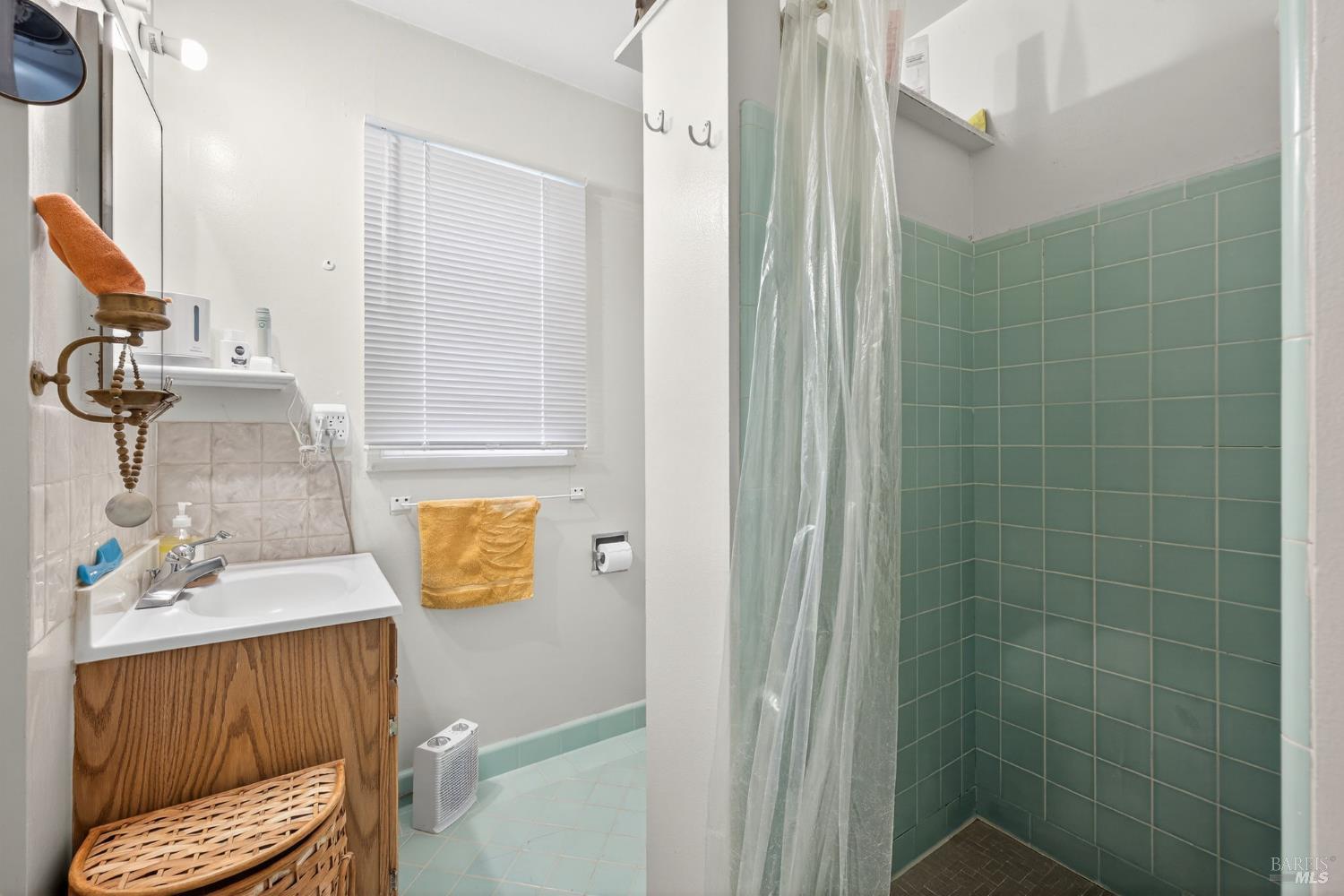 1204 14th Street Santa Rosa, CA 95404 - Photo 20 of 26 1202 14Th Street bathroom. Both duplex units have stall showers with tile surrounds and flooring.