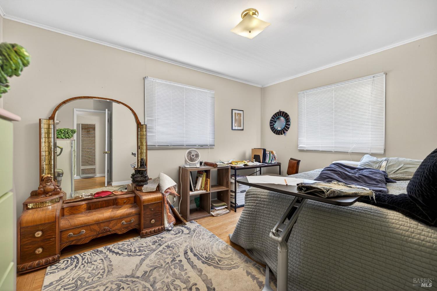 1204 14th Street Santa Rosa, CA 95404 - Photo 10 of 26 1206 14Th Street, One of two spacious bedrooms. Hardwood flooring updated dual pane windows.