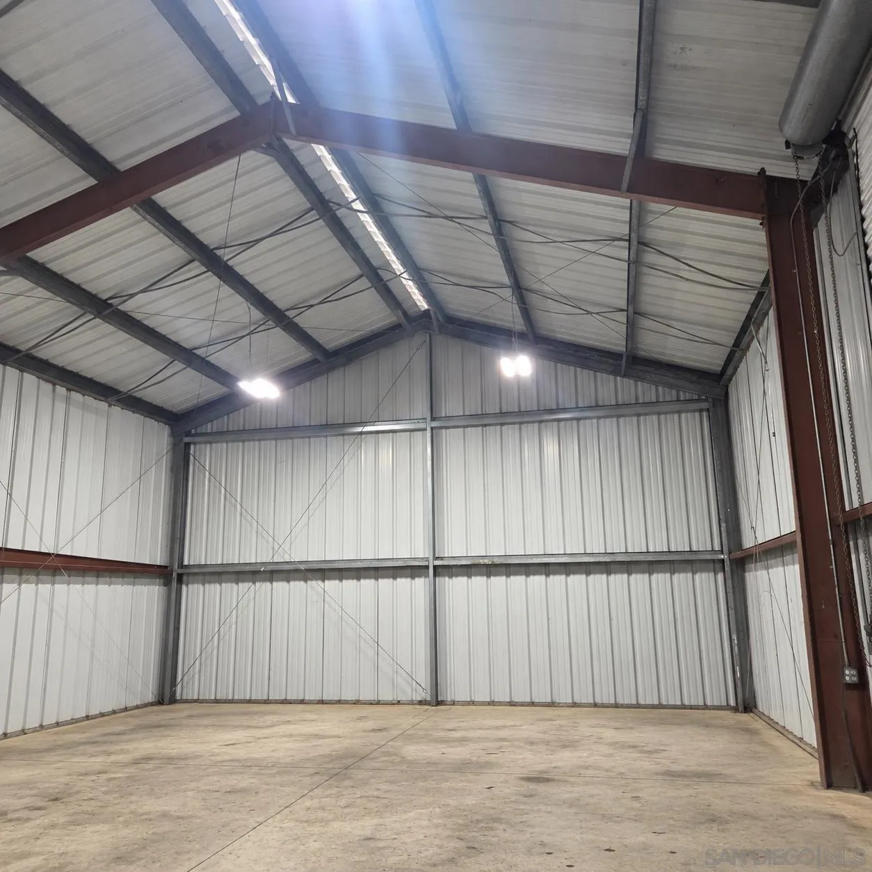 32610 Lilac Road Valley Center, CA 92082 - Photo 13 of 28 **Image enhanced** Workshop not empty