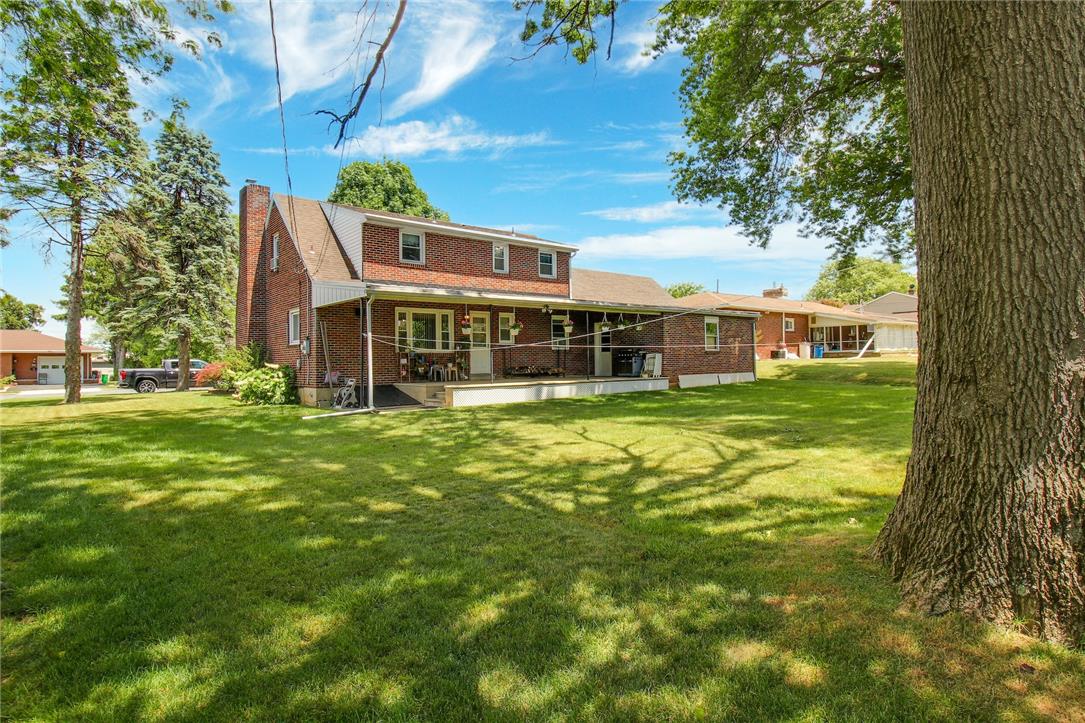 1256 Ridge Avenue Whitehall, PA 18052 - Photo 10 of 43 A deep, private backyard and expansive covered patio provide an idyllic setting for outdoor living.