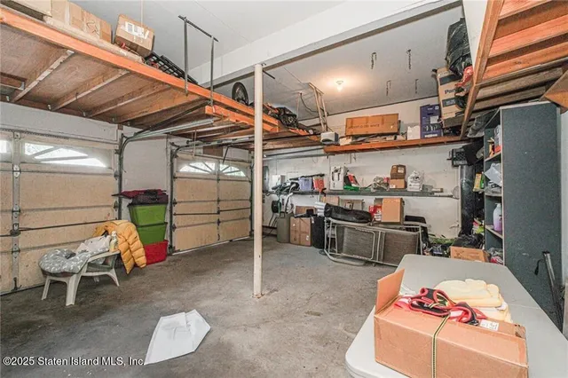 a patio with a yard table and chairs