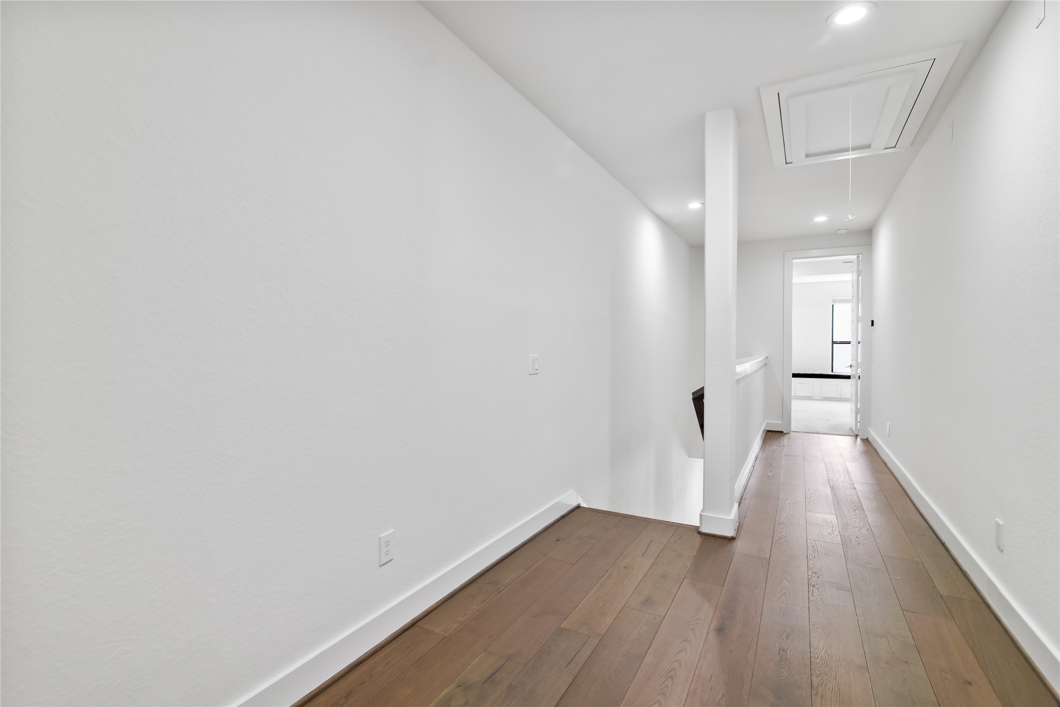 4231 Allen Street Houston, TX 77007 - Photo 21 of 31 a view of a hallway with wooden floor