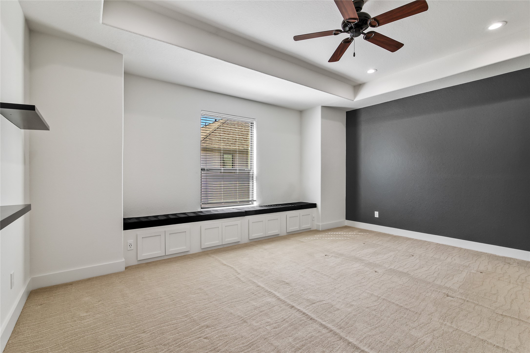 4231 Allen Street Houston, TX 77007 - Photo 22 of 31 an empty room with windows and fan