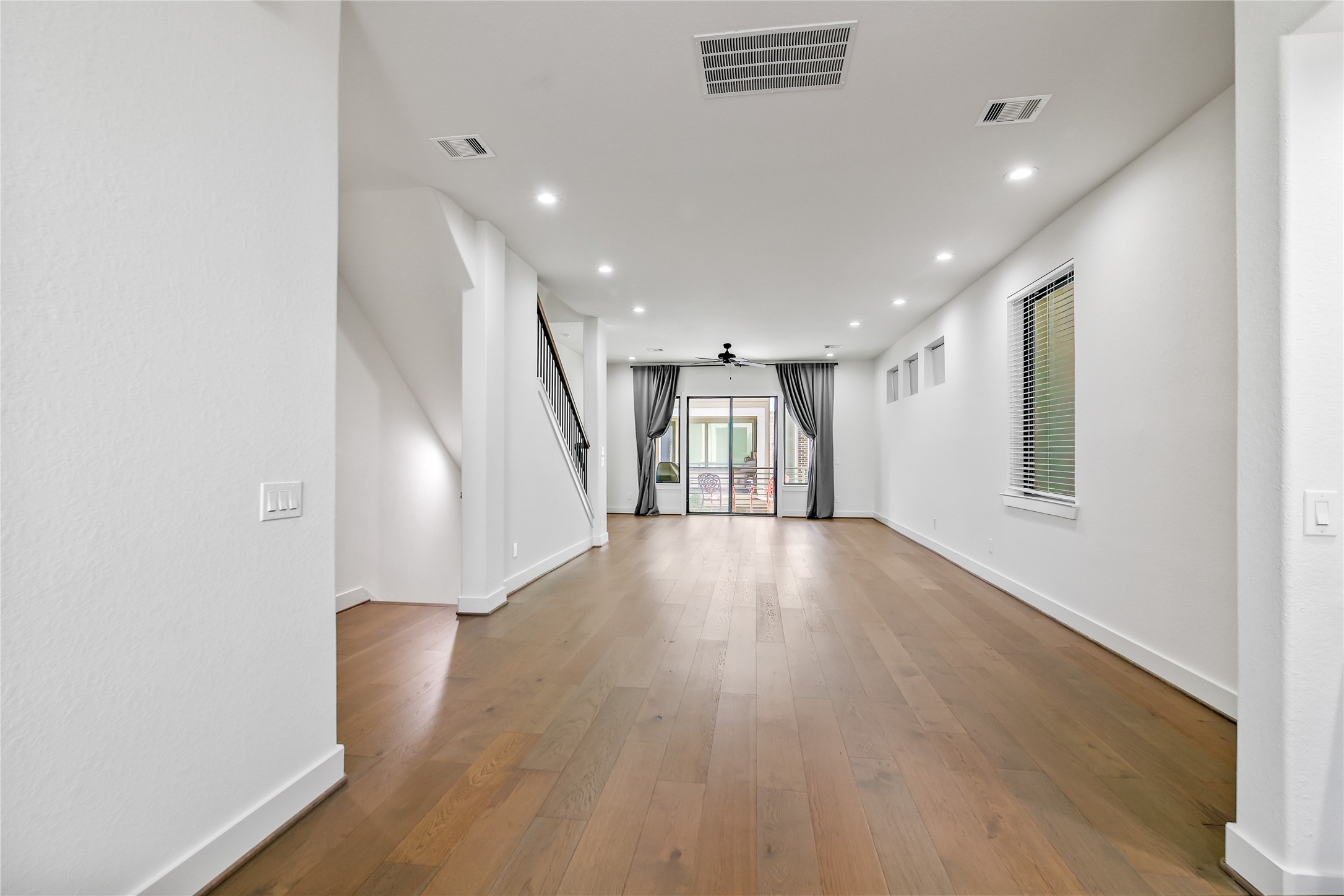 4231 Allen Street Houston, TX 77007 - Photo 5 of 31 a view of empty room with wooden floor