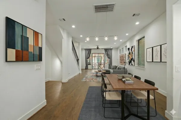 a view of a dining room with furniture
