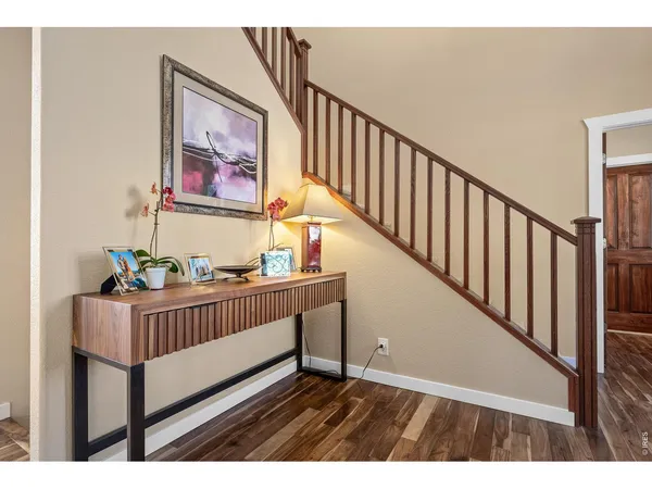 a view of entryway with wooden floor