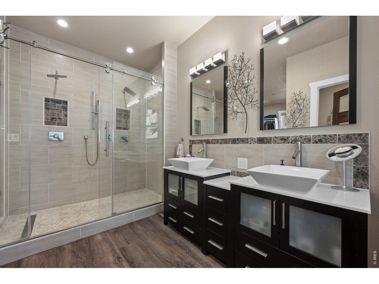 820 Peakview Road Boulder, CO 80302 - Photo 22 of 50 a bathroom with a sink double vanity and a mirror
