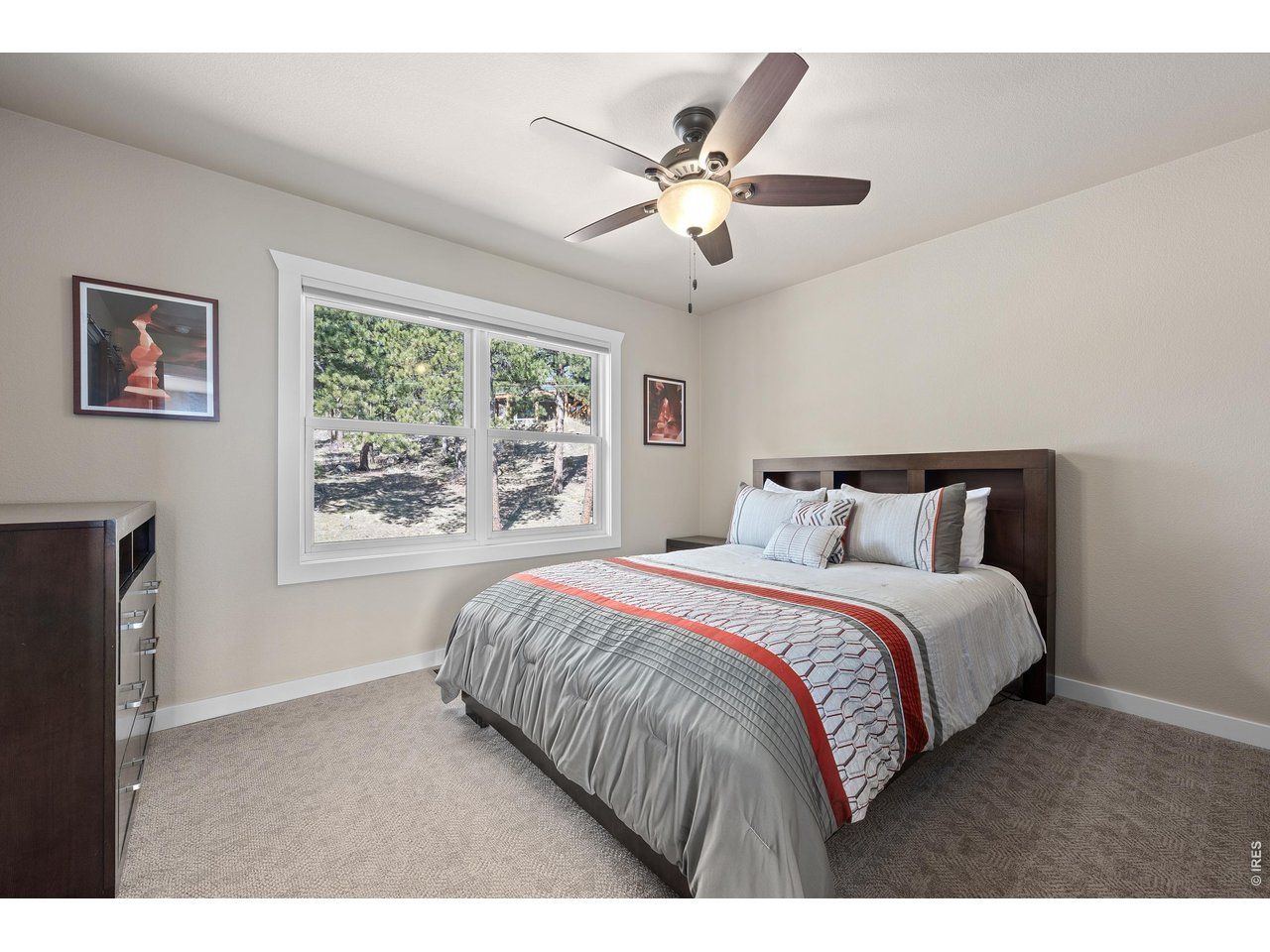 820 Peakview Road Boulder, CO 80302 - Photo 32 of 50 a bedroom with a large bed and a window