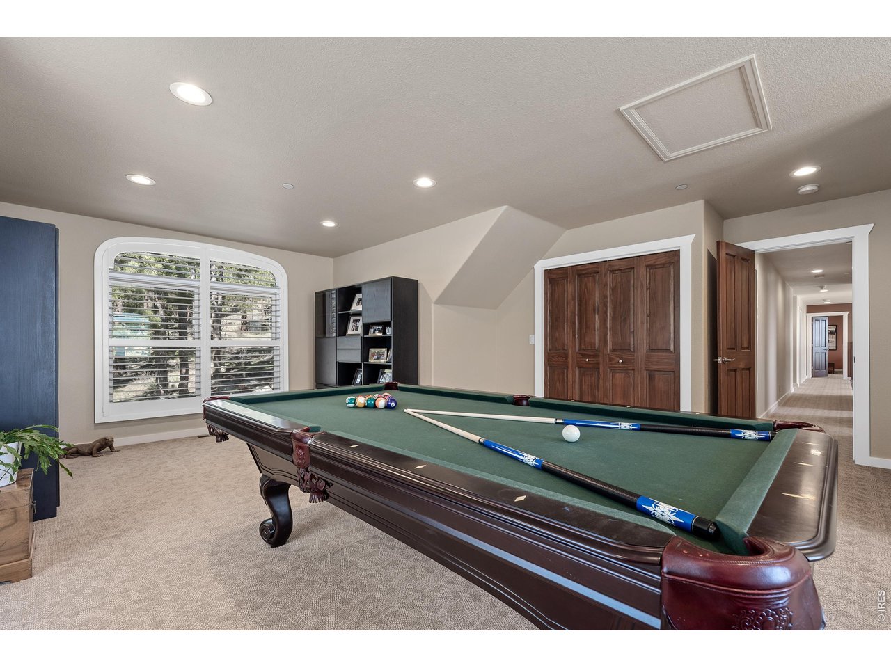 820 Peakview Road Boulder, CO 80302 - Photo 39 of 50 a living room with furniture pool table and window