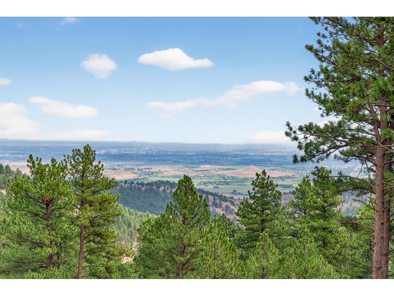 820 Peakview Road Boulder, CO 80302 - Photo 44 of 50 a view of a lake and a yard