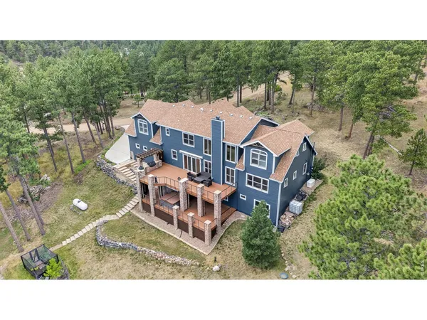 a aerial view of a house with a garden
