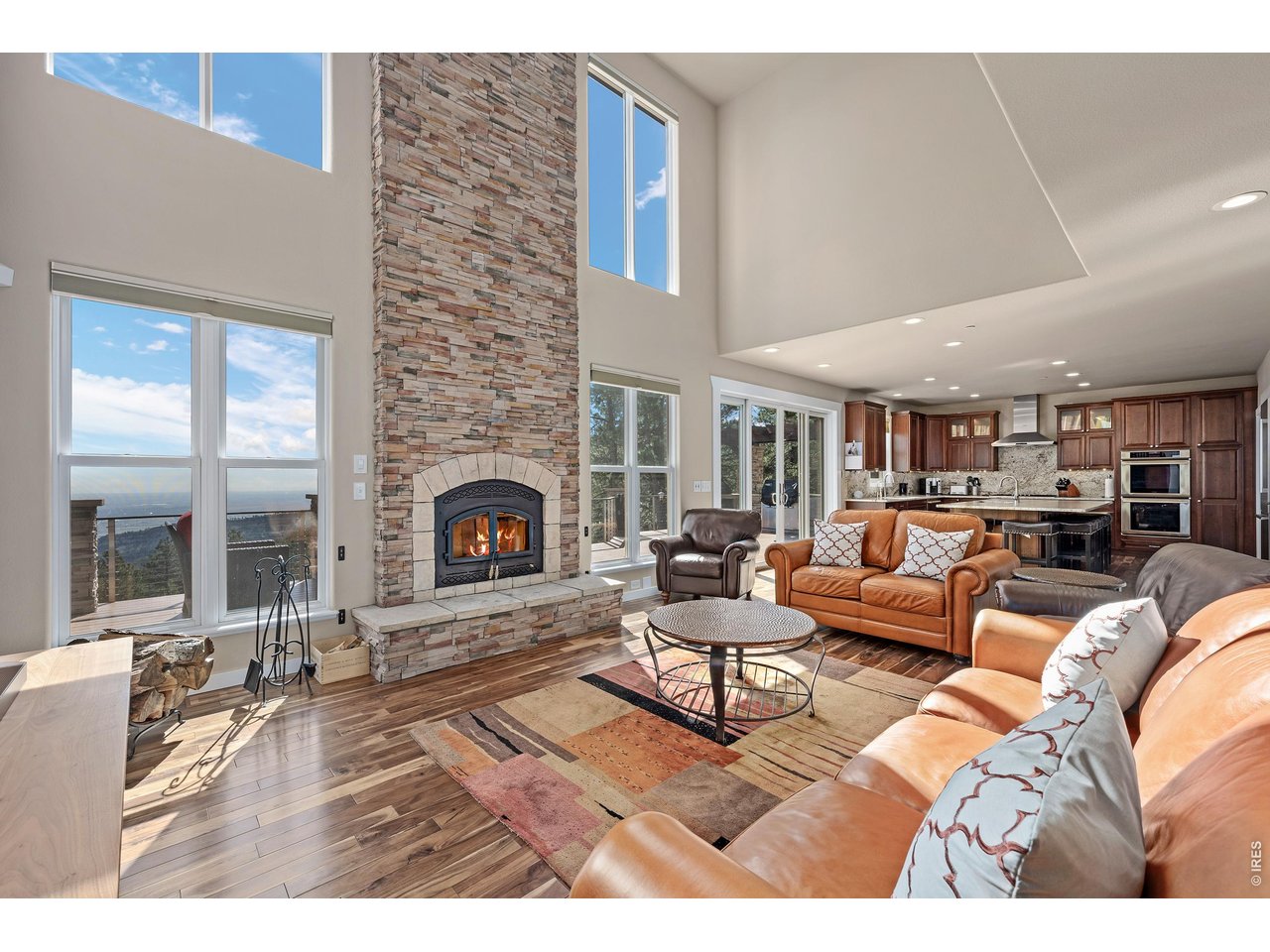 820 Peakview Road Boulder, CO 80302 - Photo 10 of 50 a living room with furniture or fireplace and a fireplace