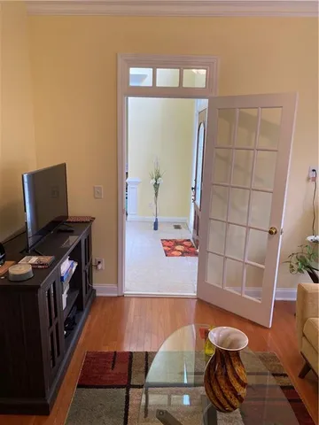 a bathroom with double sink and a mirror