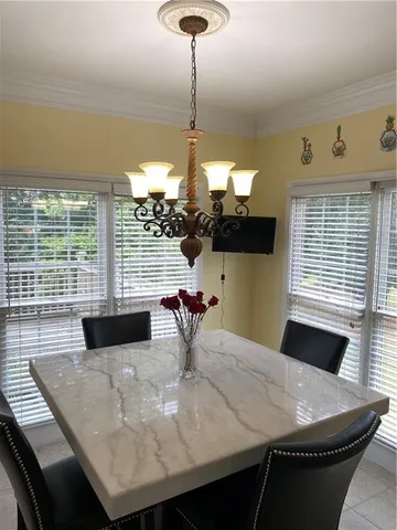 a kitchen with stainless steel appliances wooden cabinets and a stove top oven