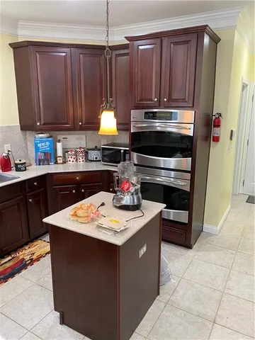 a view of staircase with a rug