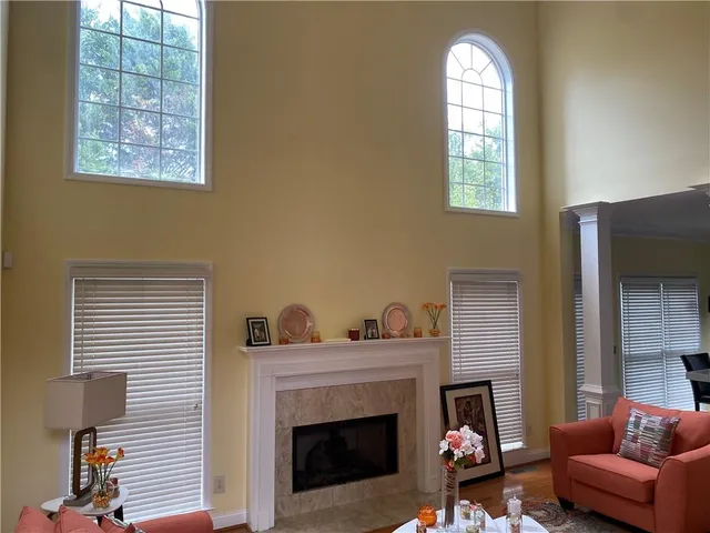 a view of a dining room with furniture and window